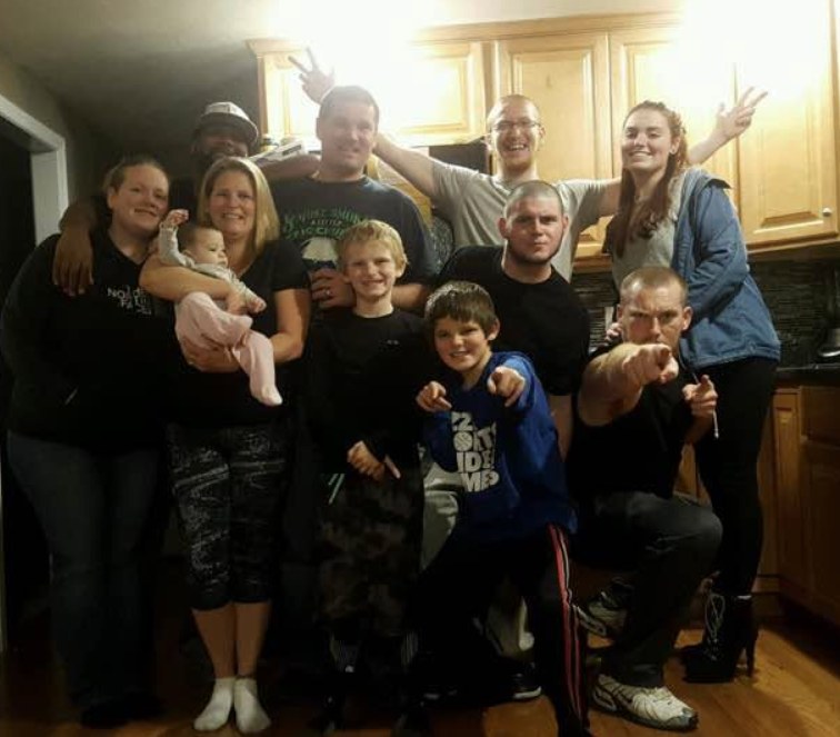 The whole crew — the family and friends who carried him through.